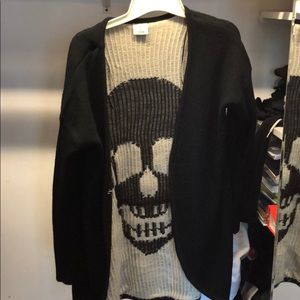 black cardigan with skull